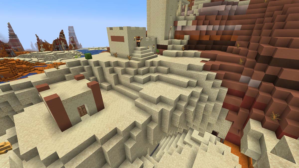 Minecraft village with a buried desert temple