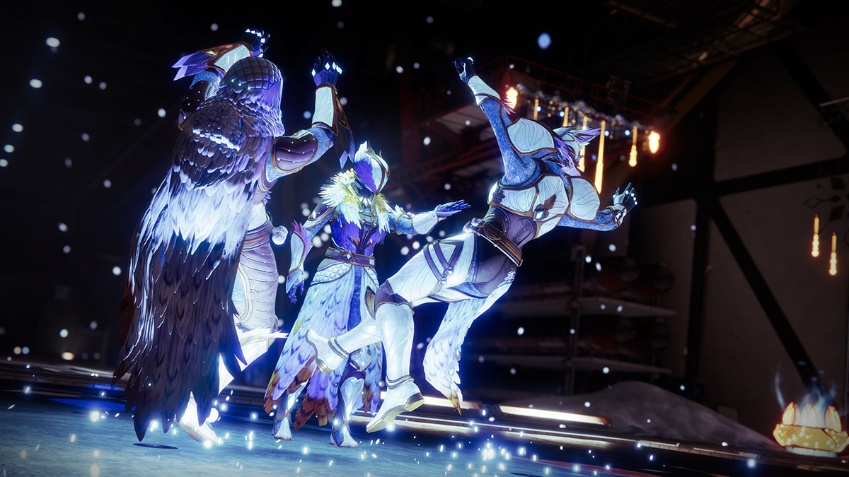 Three guardians in blue light emoting during the Dawning 2023 event.