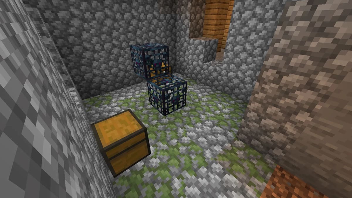 Two mob spawners inside a dungeon in Minecraft