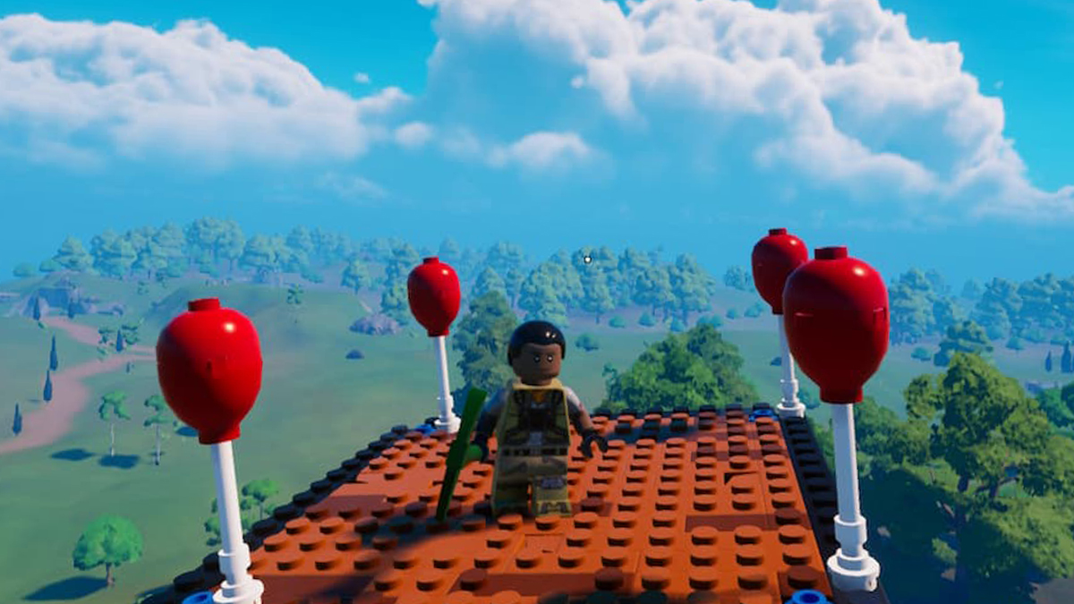 LEGO minifigure character flying on top of a platform with balloons