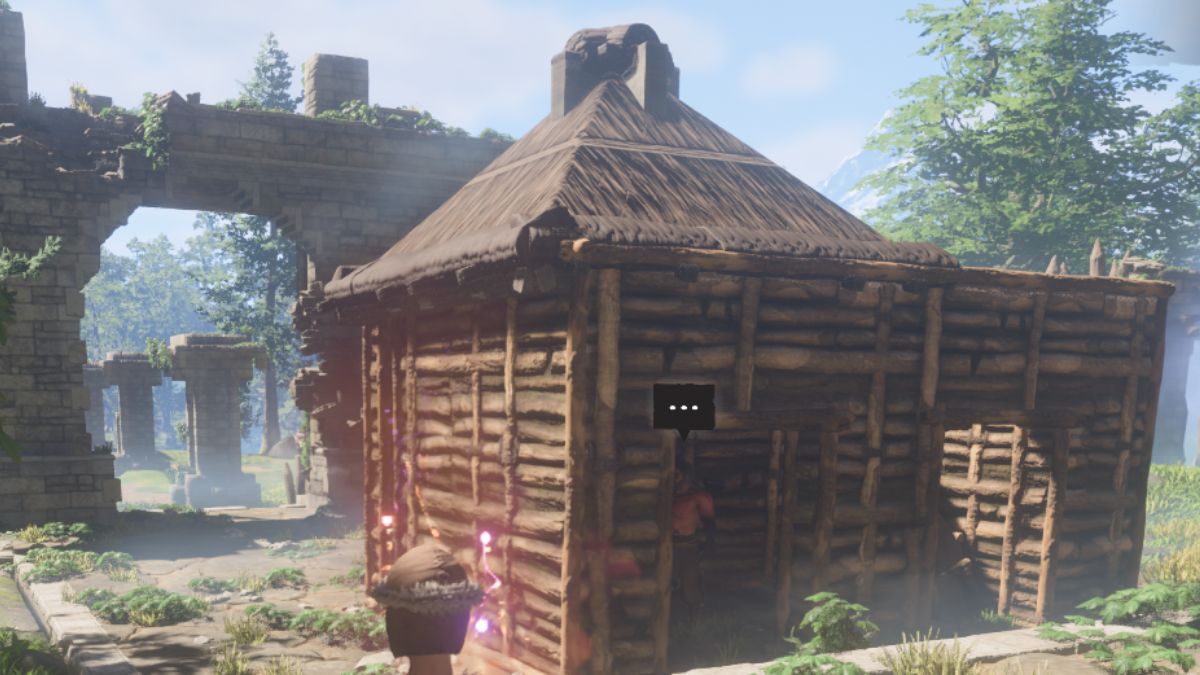 Enshrouded character standing in front of wooden building.