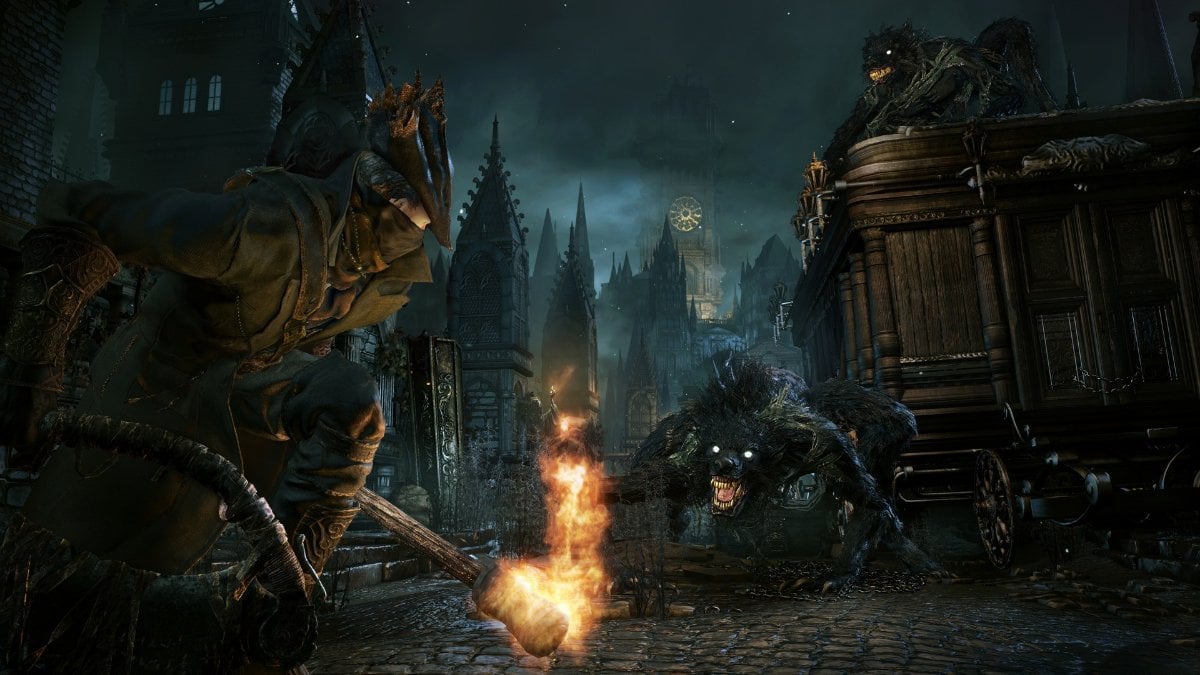 The Hunter from Bloodborne stands in front of a werewolf, during night.