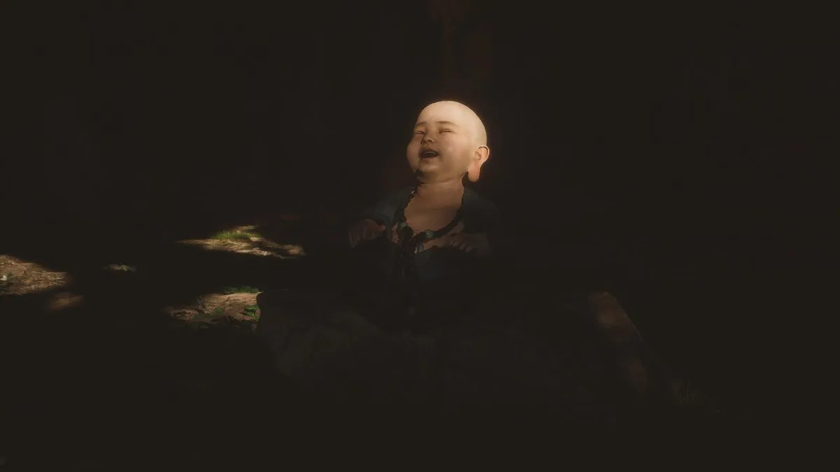 A small bald boy laughs surrounded by darkness in Black Myth: Wukong