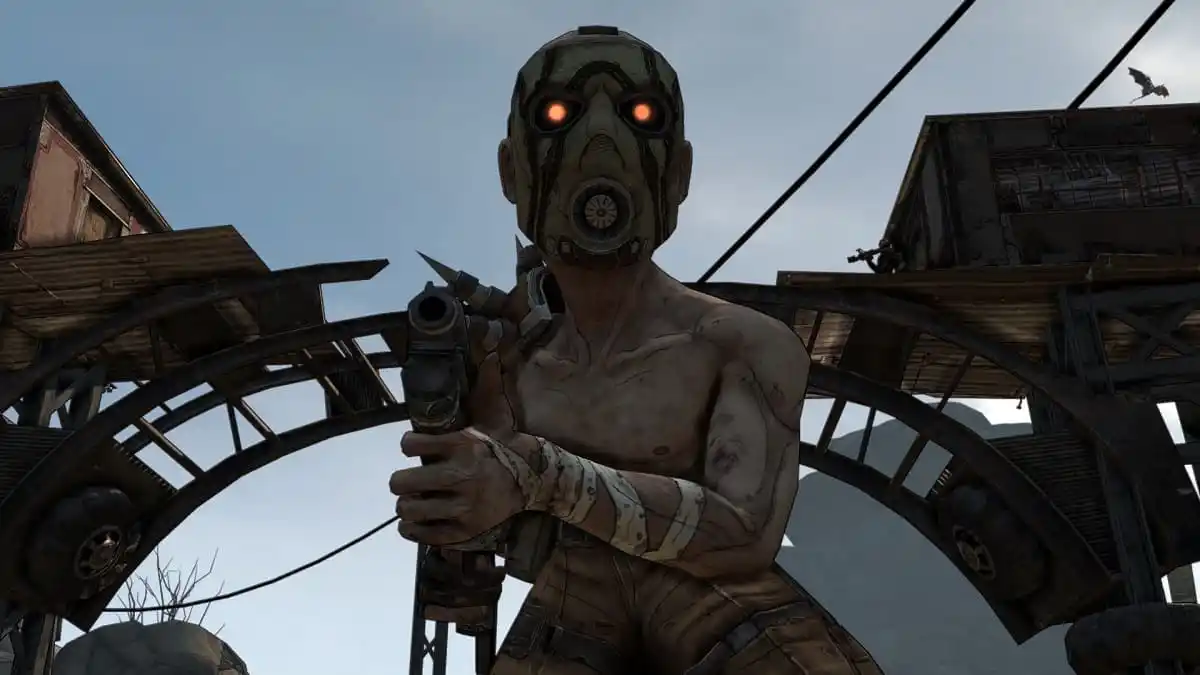 Psycho in Borderlands pointing a gun at the camera