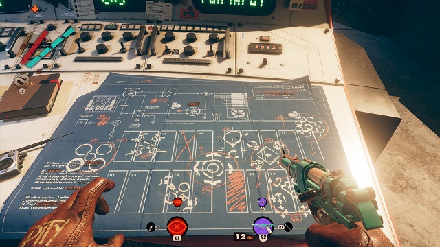 A blueprint on a computer terminal marking the pictograms for each cassette tape.