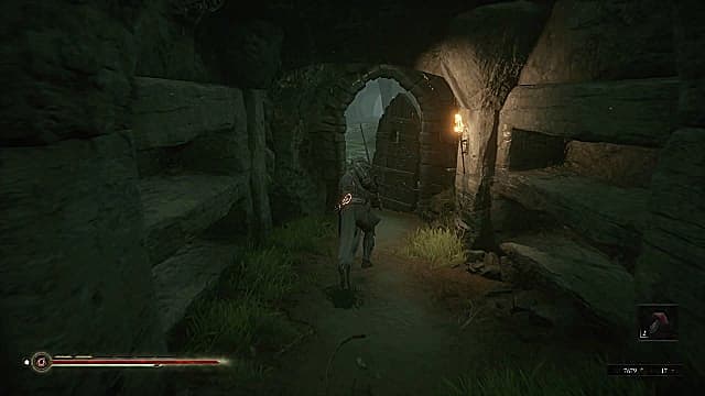 Solomon holding hallowed sword, running toward the wooden door of Fallgrim Tower.